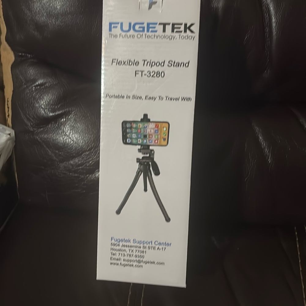 In the box brand new. Flexible tripod stand.